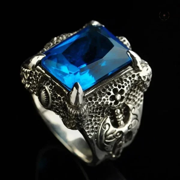 Bague Griffes de Dragon ornée d'une pierre