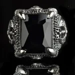 Bijou Bague Dragon design griffe avec gemme