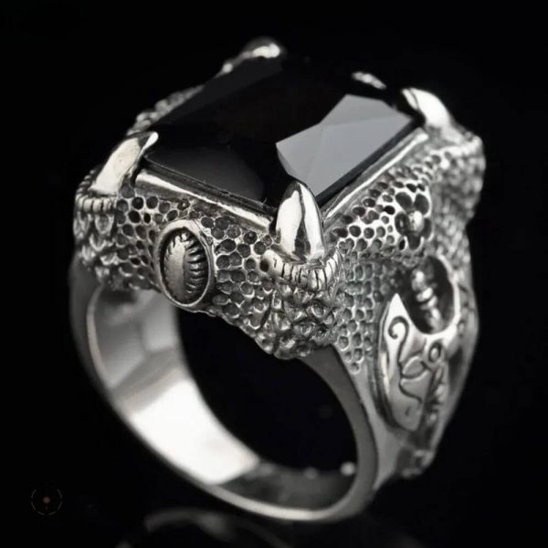 Bague avec design de dragon et pierre précieuse