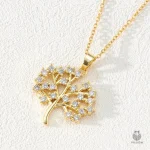 Collier avec pendentif en métal en forme d'arbre