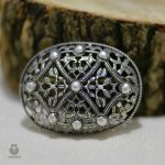Bijou Viking avec design maillé, accessoire unique